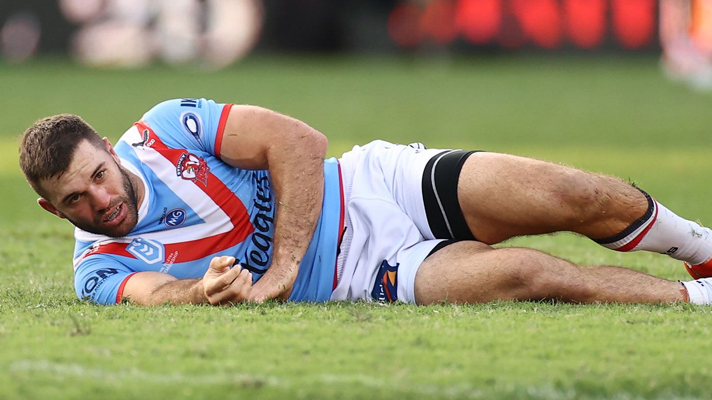 James Tedesco is rocked by a hit from Jordan Perreira. (Getty)