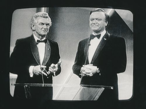 Prime Minister Bob Hawke presents Bert Newton with his 1984 Gold Logie.