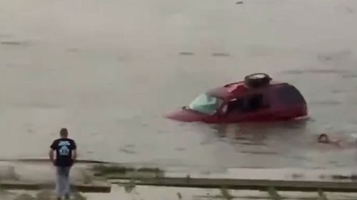 The car rolled into the Ohio River when one of the little girls put it into neutral.