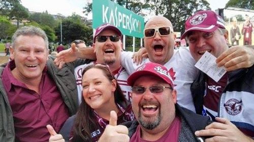 Jason 'Buddy' Miller (below centre) with his football mates.