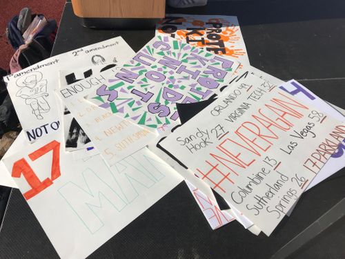 The Santa Monica students have made placards as part of their action calling for stricter gun control. (Charles Croucher/9NEWS)