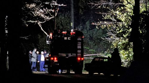 Policemen work at the site where Amina Okuyeva, the wife of a Chechen volunteer soldier Adam Osmayev who allegedly plotted to assassinate the Russian President in 2012, was shot dead after their car on Monday. Image: Getty