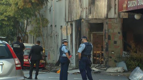 Police investigating after one person killed in a boarding house fire in Newtown.
