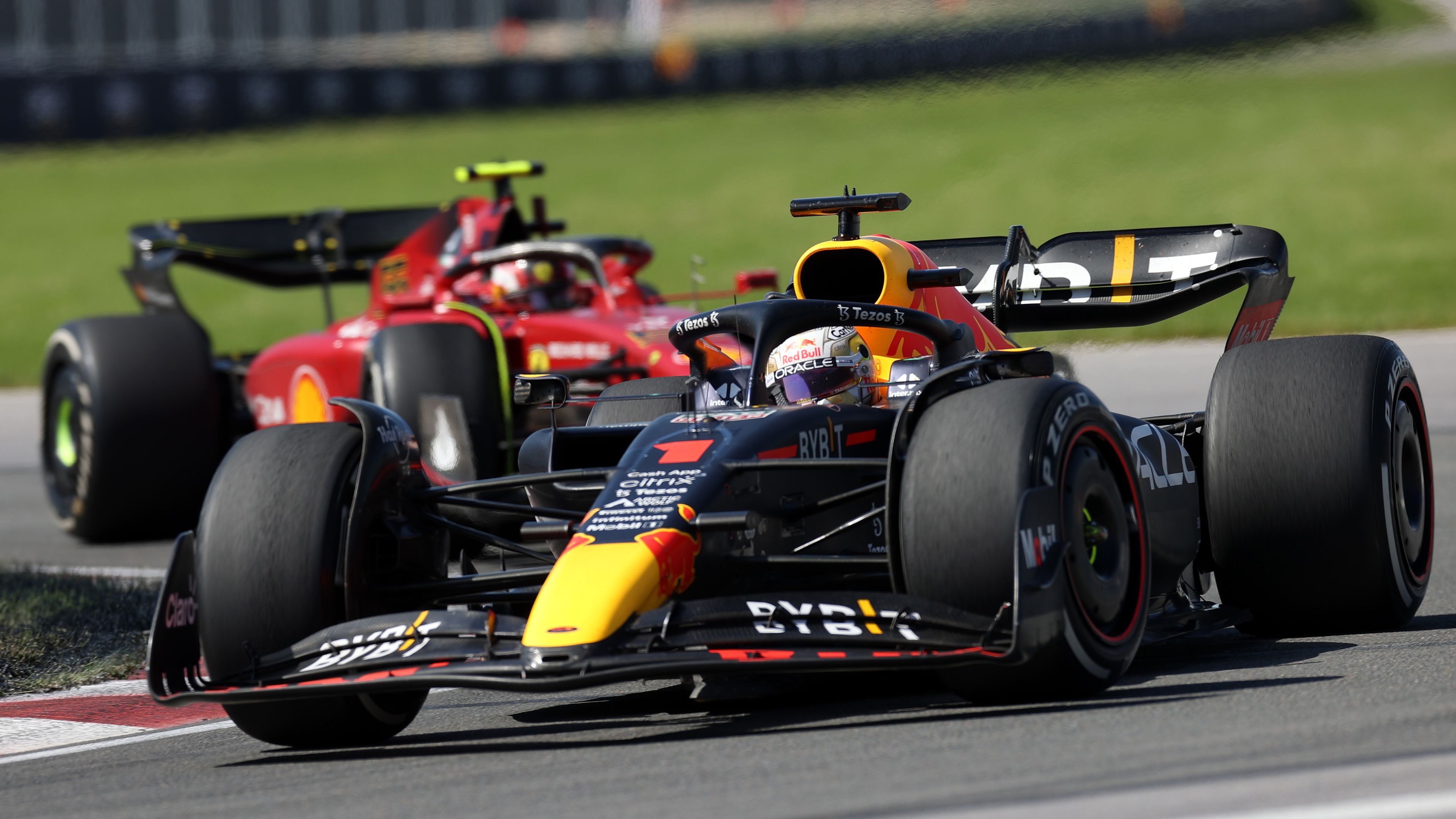 Max Verstappen leads Carlos Sainz.