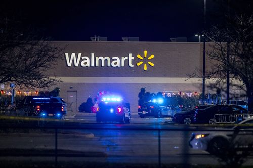 Police respond to the scene of a mass shooting at a Chesapeake, Virginia, Walmart Tuesday, November 22, 2022.