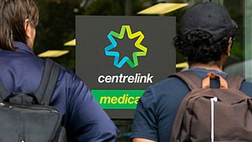 Young people outside Centrelink office (Getty)