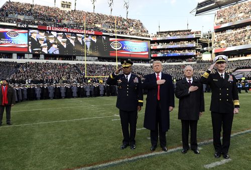 Mattis, pictured with Trump listending to the national anthem at an American football match, is seen as a stabilising force in the administration.