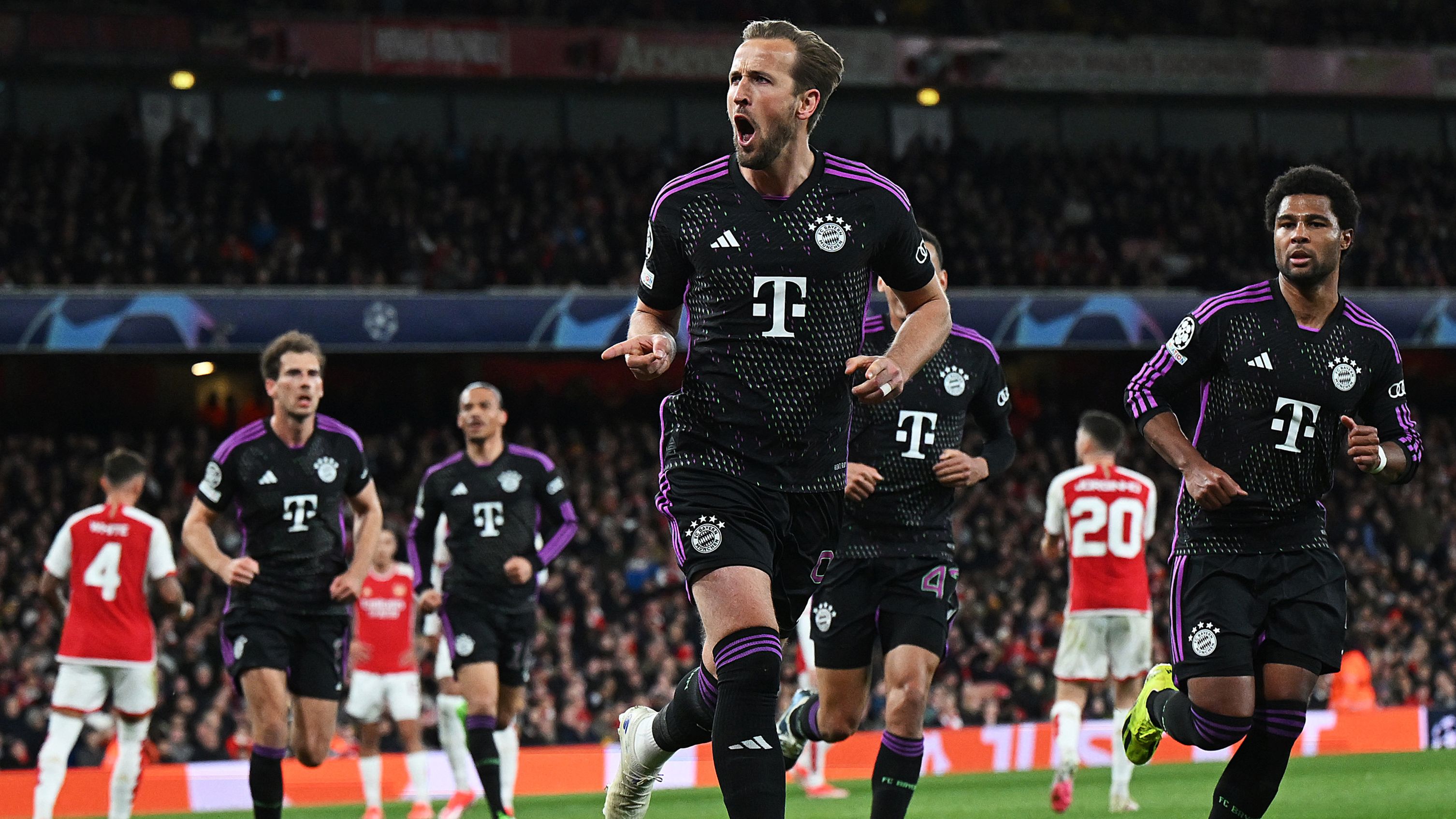 Harry Kane of Bayern Munich celebrates scoring his team&#x27;s second goal from a penalty.