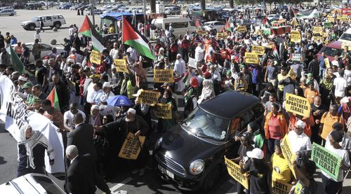 Protesters take part in a march to parliament in Cape Town, South Africa against the use of the deadly force used by Israeli troops against Palestinians. Picture: EPA