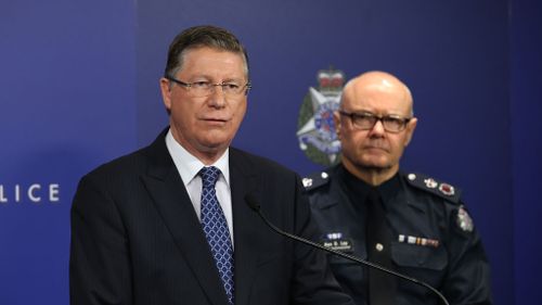 Premier Denis Napthine and Police Commissioner Ken Lay have urged Victorians to "continue as normal". (AAP)