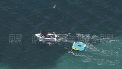 A private boat has rescued two women stranded at sea on an inflatable toy in Western Australia.