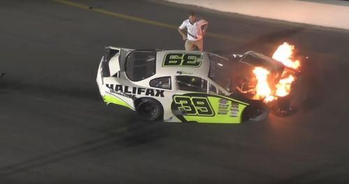 Mike Jones' race car bursts into flames after the crash at South Boston Speedway. Picture: Supplied