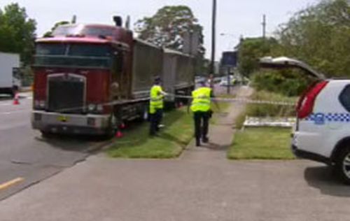 Woman dies after being hit by truck in Auburn