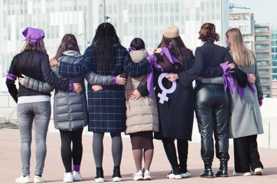 Multiracial group of women only on violence protest International Women's Day