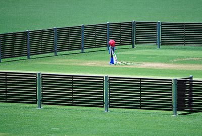 A bat rested on the stumps in the middle of Adelaide Oval, Hughes' adopted homeground.