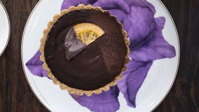 Recipe: <a href="https://kitchen.nine.com.au/2018/01/12/14/27/dark-chocolate-tartlets" target="_top">Dark chocolate tartlets with candied orange</a>