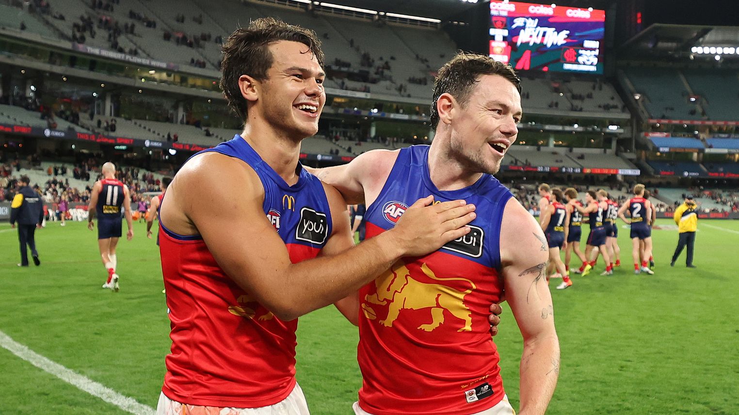 Lachie Neale and Cam Rayner post match.