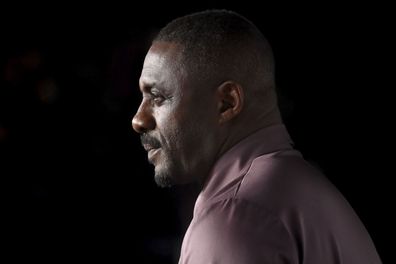 Idris Elba says he's a 'workaholic' and is in therapy to tackle 'unhealthy habits'.