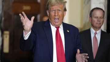 Former President Donald Trump arrives for his civil business fraud trial at New York Supreme Court, Tuesday, Oct. 17, 2023, in New York. 