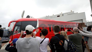 Fans at the Manchester United bus in Perth.