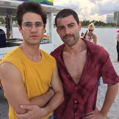 <em>Glee </em>alumni Darren Criss, pictured here on set with <em>New Girl</em> actor Max Greenfield, is playing <em>Versace</em>'s killer Andrew Cunanan. This on-set photograph was released by producer Ryan Murphy.