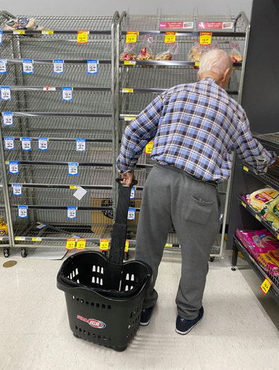 Elderly man searching for bread at IGA Hurstville.