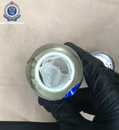 Cocaine allegedly found inside a Red Bull can. Officers stopped and searched a vehicle on Eloura Road, Cronulla, allegedly finding $2970 cash, four mobile phones, and more than 13 grams of cocaine concealed in the energy drink can.