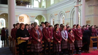 Pupils of Roncalli College at the Mass for crash victims at Sacred Heart Basilica, Timaru.