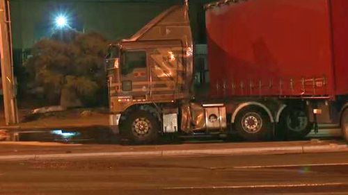 The truck’s fuel tanks were ruptured on impact, causing fuel to spill onto the roadway.