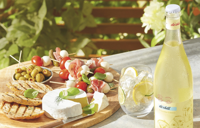 De'Chill Frizzante Bianco NV sparkling wine and cheese platter lifestyle photo