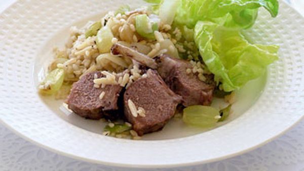 Rosemary crown roast of lamb with rice, grape and almond stuffing