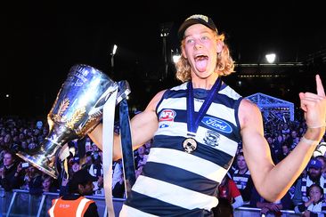 Sam De Koning of the Cats on stage after winning today&#x27;s 2022 AFL Grand Final, at Yarra Park on September 24, 2022 in Melbourne, Australia. (Photo by Morgan Hancock/Getty Images)
