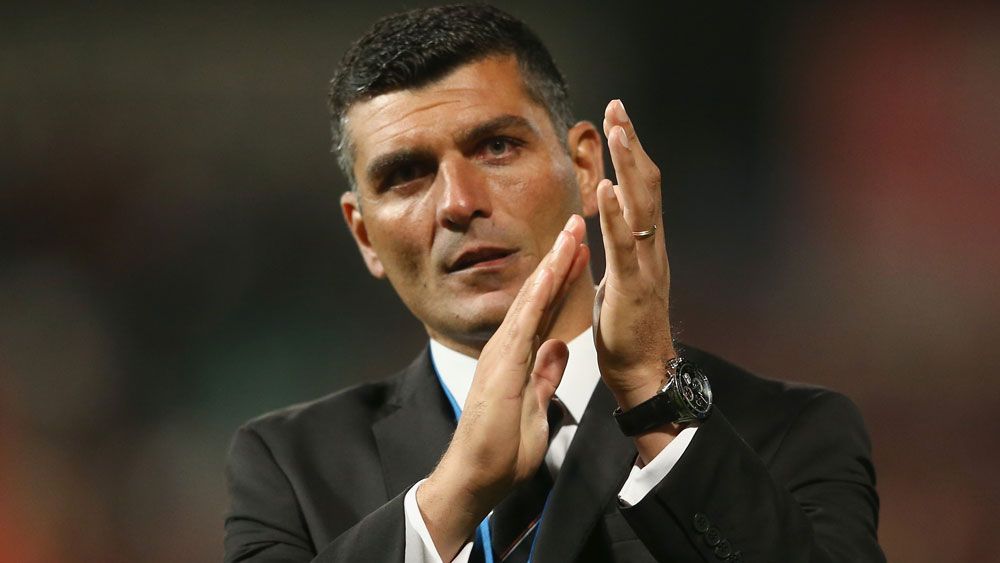 Roar coach John Aloisi has denied he's considering a big money move to Adelaide. 
