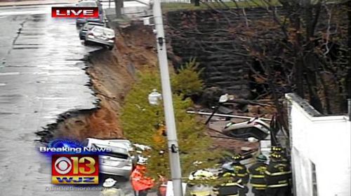Cars suddenly plunge into abyss as US road collapses