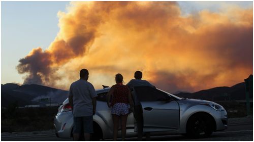 Hundreds of homes and buildings destroyed as wild fires continue to burn through California