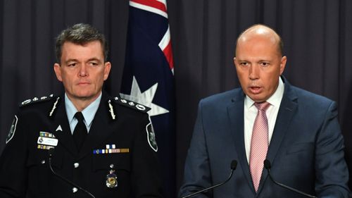 Australian Federal Police Commissioner Andrew Colvin and Minister for Home Affairs Peter Dutton.