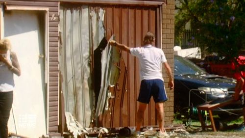 Four people escaped the blaze after the two story house in Urangan, Hervey Bay, caught alight.