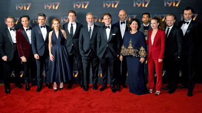 Cast of "1917" pose inside the foyer of the Odeon Luxe Leicester Square at the World Premiere and Royal Performance on December 04, 2019