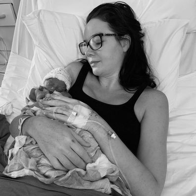 Jade Redmond holds her first child, Harper.