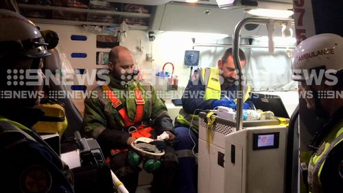 They were checked by paramedics but weren't injured after the "high risk" operation. (9NEWS)