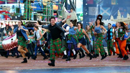 Dancers greet the crowd. (Getty)