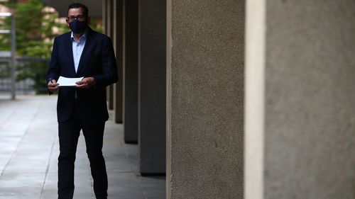 Victorian Premier Daniel Andrews arrives for a press conference in Melbourne, Australia, as metropolitan Melbourne and the Mitchell shire remain in lockdown.