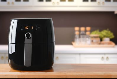 Air fryer machine in kitchen.