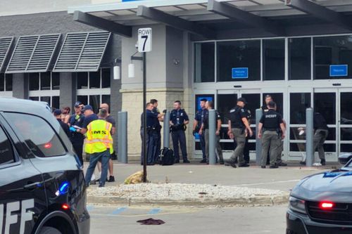 Law enforcement officers responding to a stabbing attack at a Walmart in Traverse City