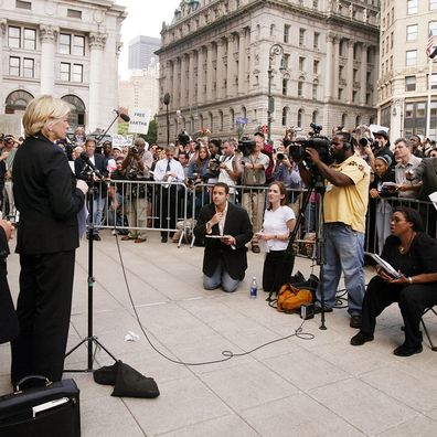 NEW YORK - JULY 16:  Martha Stewart speaks to the media outside Federal Court after her sentencing hearing July 16, 2004 in New York City. Stewart was sentenced to five months in federal prison, 2 years probation and 30,000 dollars in fines. (Photo by Mario Tama/Getty Images)