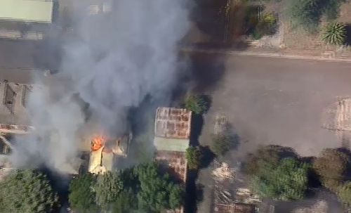 Fire crews are battling the massive blaze. (9NEWS)