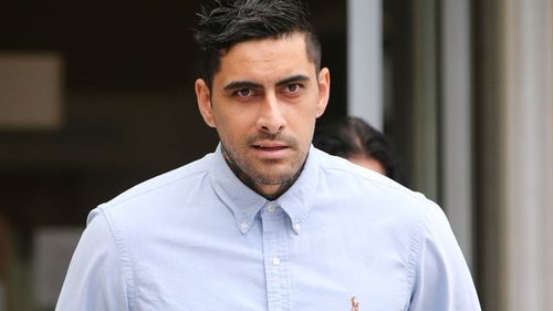 Che Quaedvlieg leaves the Brisbane Magistrates Court after being fined $500 after being caught with a small bag of ecstasy. (Image: AAP)