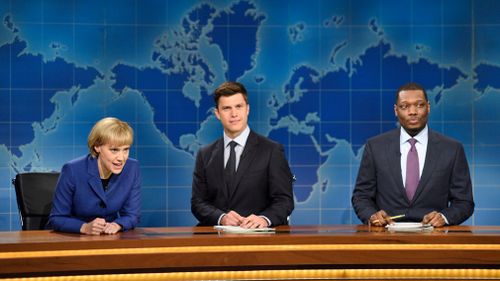 Kate McKinnon portraying German Chancellor Angela Merkel appears with Weekend Update hosts Colin Jost and Michael Che. (AP)