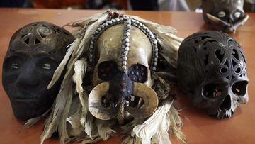 Indonesian custom display skulls and sent from a post office during a press conference in Bali. (AAP)