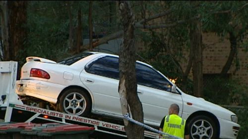 Police take the car for forensic testing in 2013. (9NEWS)